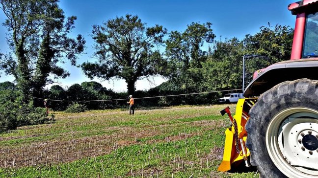 Winch tractor assisting felling